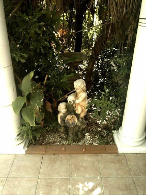 tiled_courtyard_cherub_feature